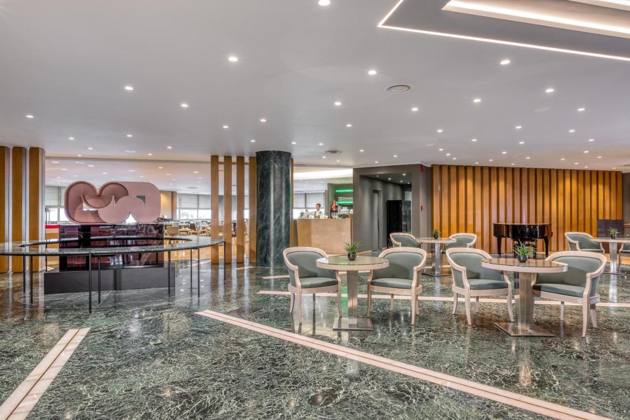 Divani Caravel Atenas Exterior foto The lobby of the hotel